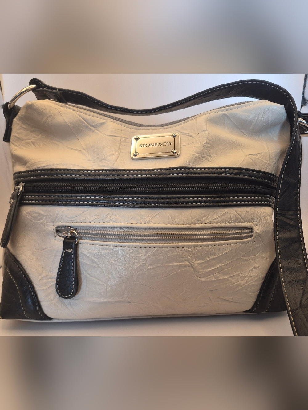 Stone & Co. Cream Shoulder Bag with Black Trim and Front Zips